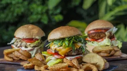 Colorful assortment of ultra-processed foods, displaying items like chips and sweets that are common in convenience foods discussions.