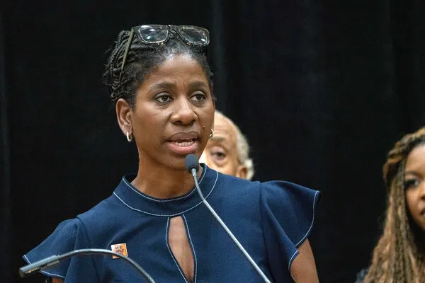 Clear and professional photograph of WNBA players during a protest, highlighting voices in the CBA movement.