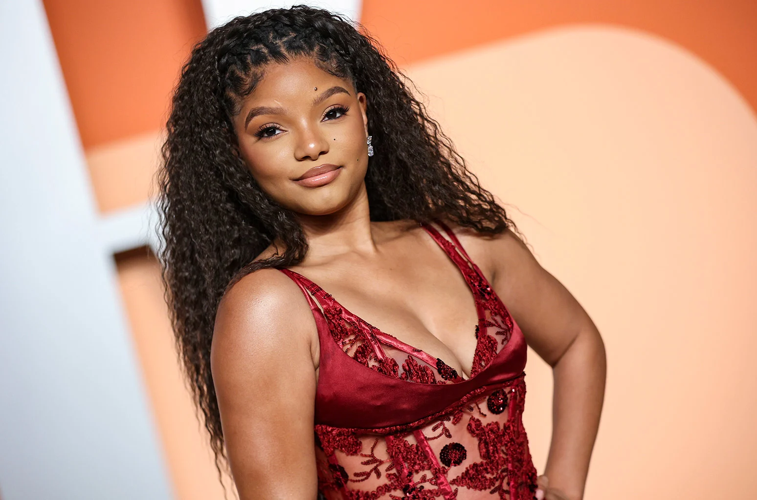 Halle Bailey's debut solo album, 'Love? Or Something Like It,' is set to release soon. The album is preceded by personal singles 'Back and Forth' and 'Braveface,' which addresses her journey into motherhood and postpartum depression.