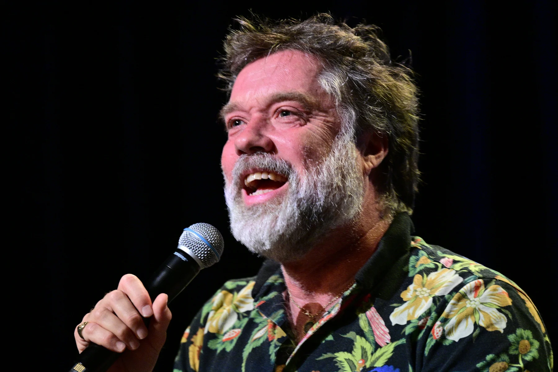 Publicity photo of Rufus Wainwright at a music festival, artistically composed and suitable for music award topics.