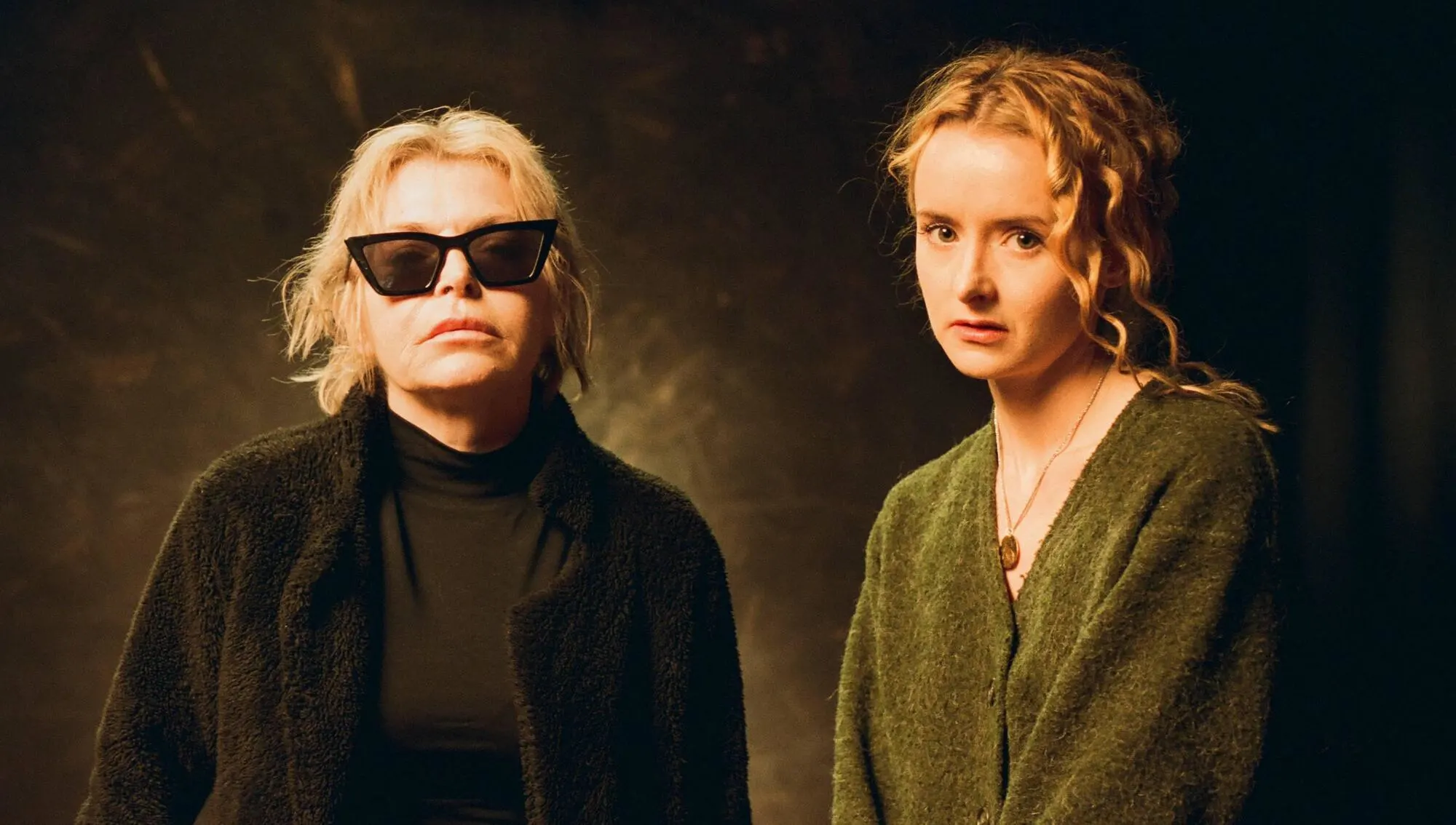 Image showing Myrid Carten alongside another woman, natural lighting and setting, sharp and good quality
