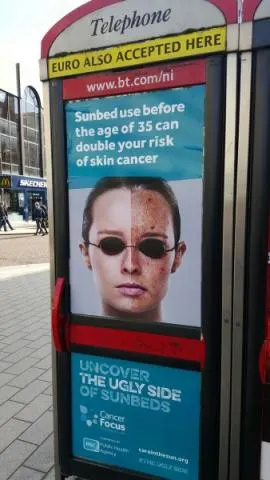 Public health visual showing a sunbed unit in a neutral setting, often used in awareness campaigns.
