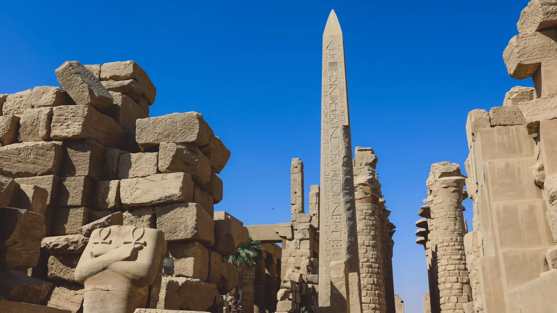 The ruins of the Obelisk of Thutmosis I standing amid the remains of Karnak Temple, offering a glimpse into Pharaonic engineering.
