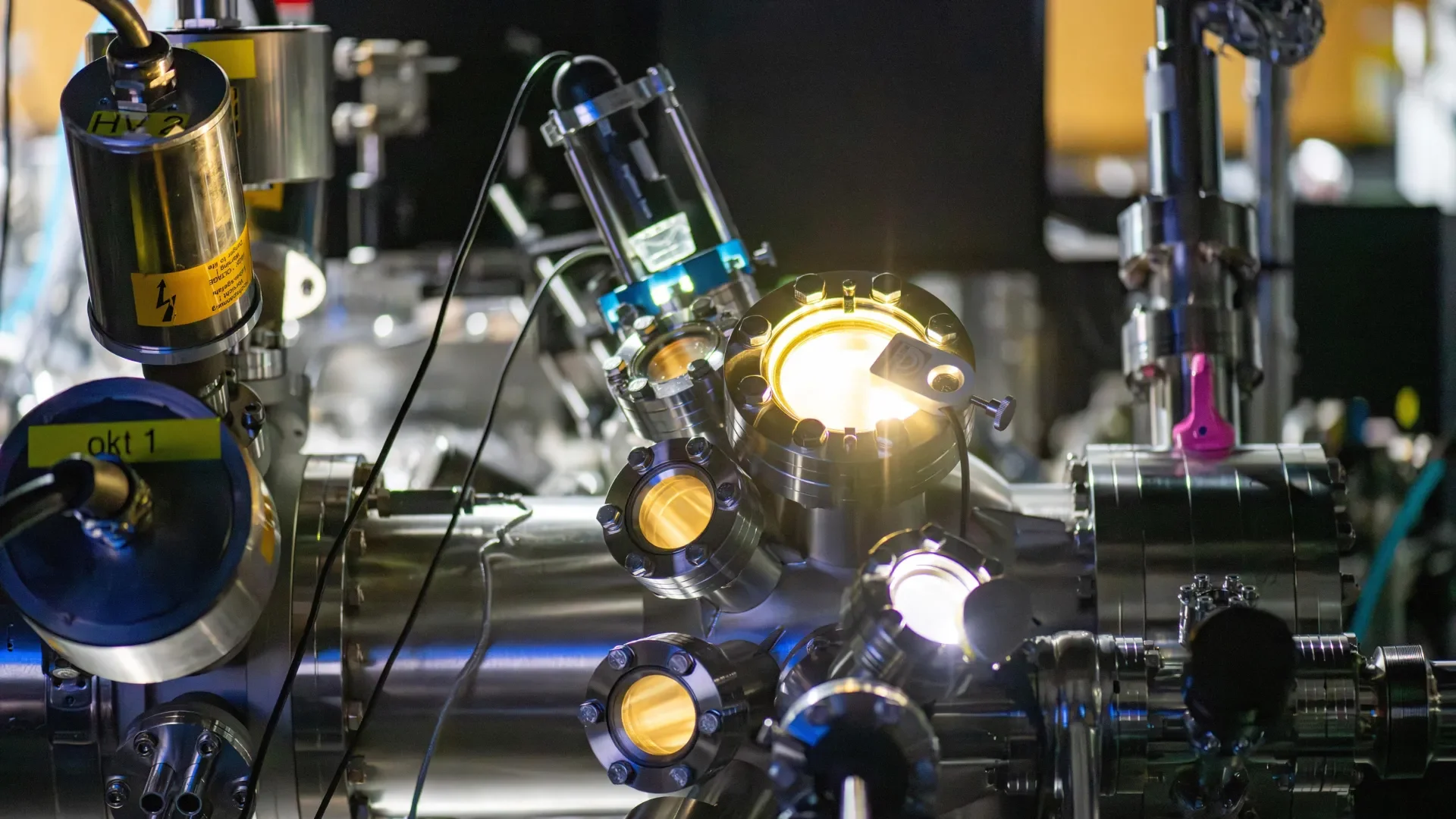 High-quality setup image of the TR-ARPES experimental apparatus used in dark exciton research, without overlaid text.