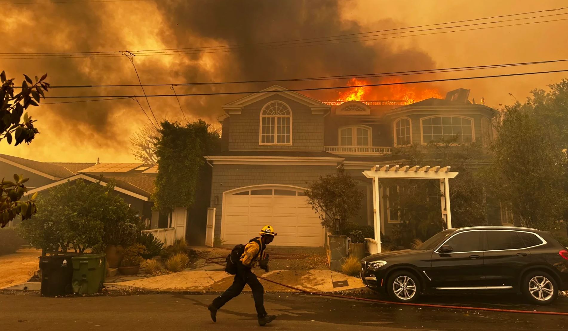 Fire fighter running to help