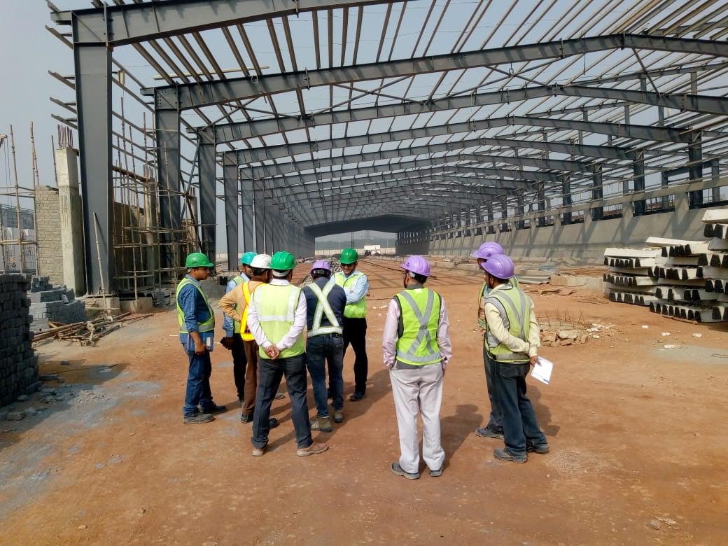 ASTPL site team and pre-engineered steel structure