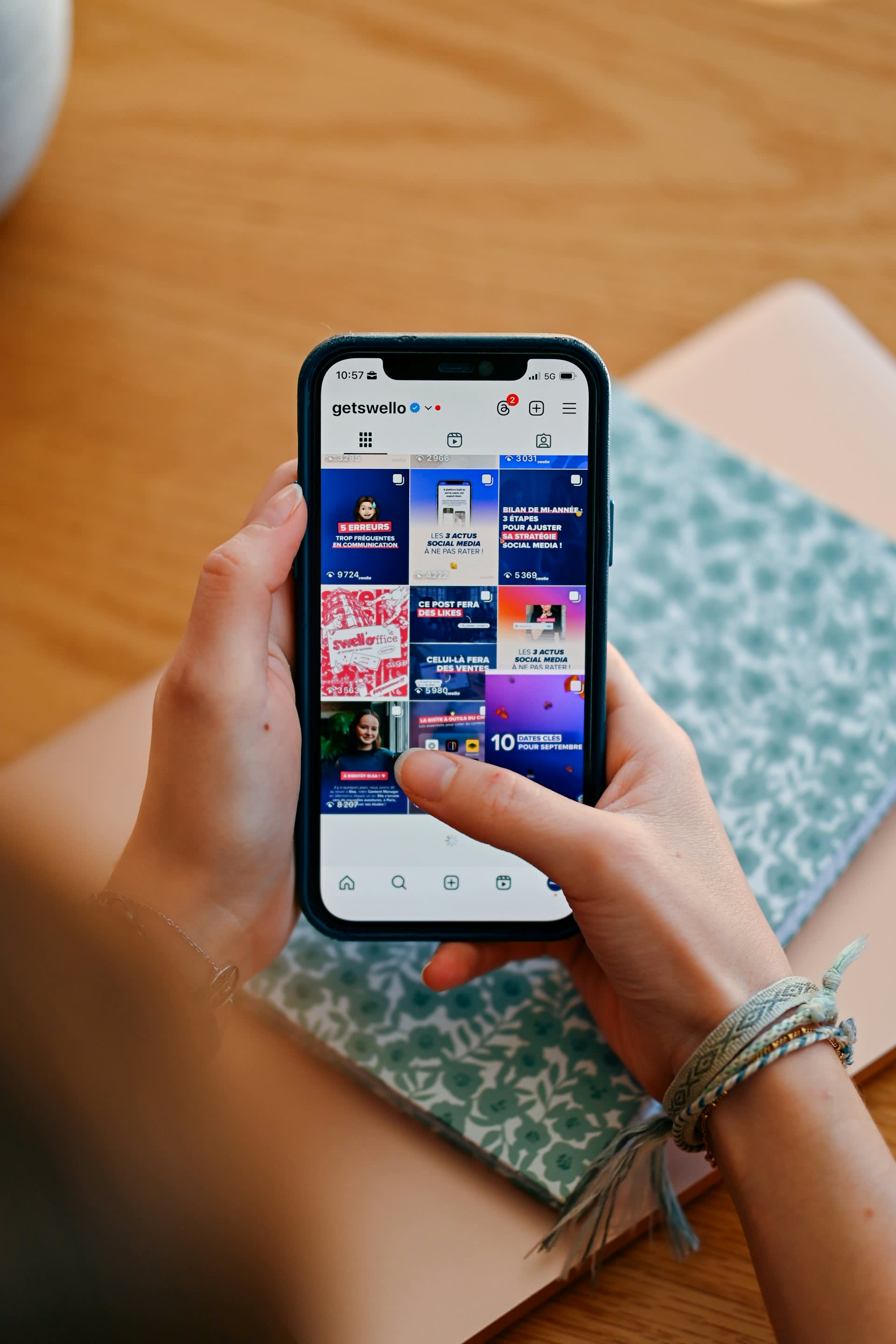 Person scrolling through social media video feed on mobile phone