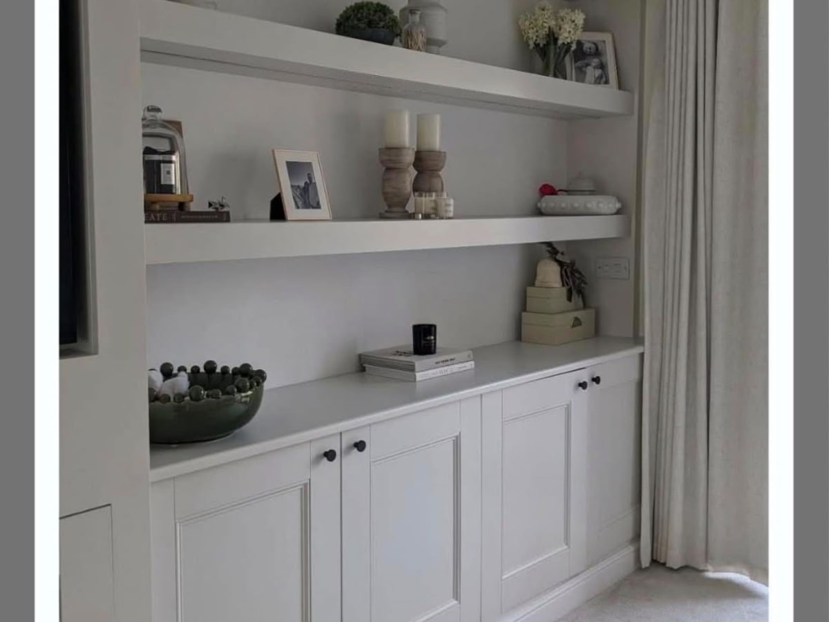 Clean built-in cabinets and styled shelving