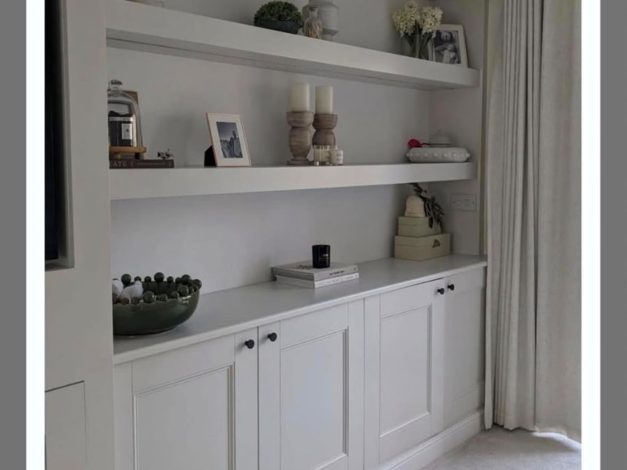 Clean built-in cabinets and styled shelving