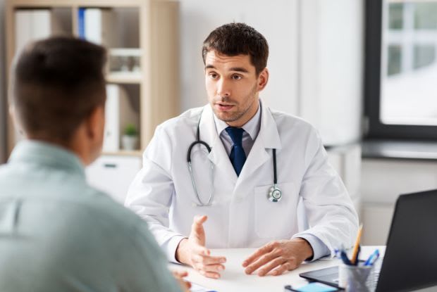 A doctor talking to a patient