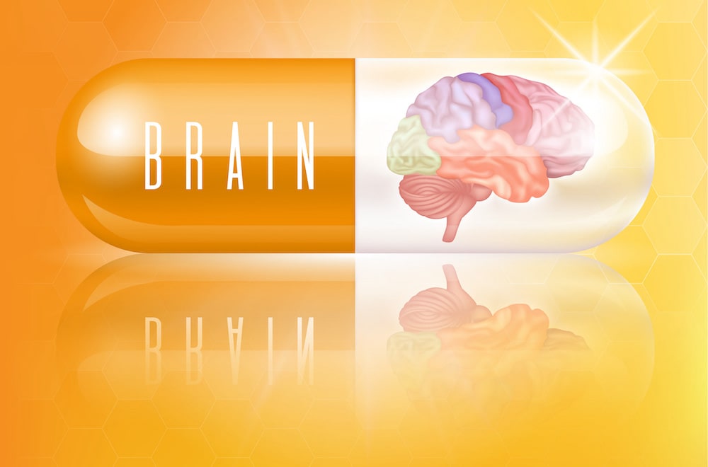 Graphic of an anti-nausea pill on an amber background with a brain and the text “brain”