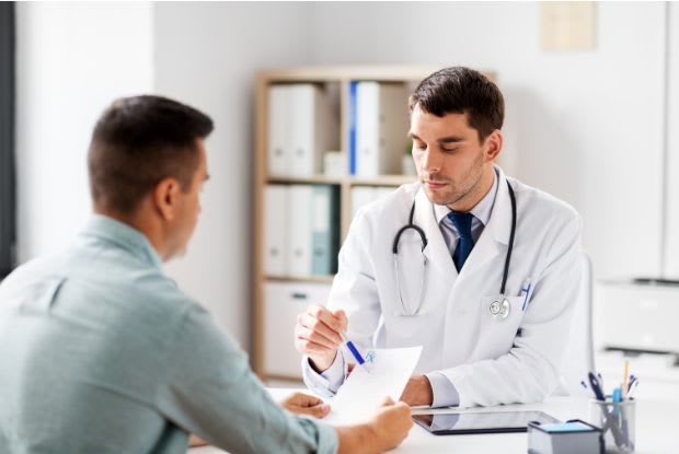 a man consulting a doctor