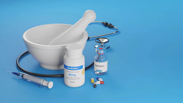 A Mortal, pestle, medication, and syringe on a blue background.