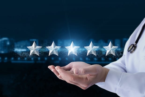 five stars hovering above doctor’s hands.