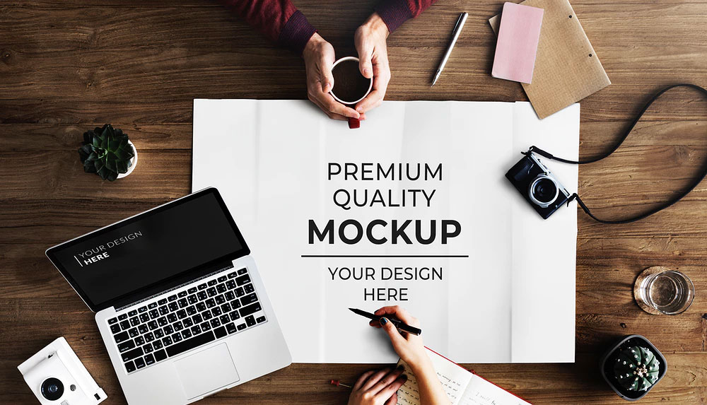 Poster Mockup on a Wooden Table