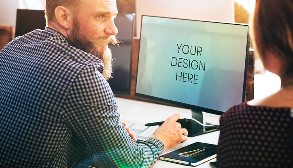 Man using a Computer Screen Mockup