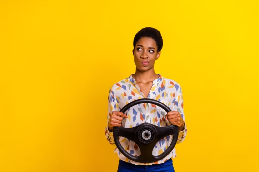 Person with steering wheel