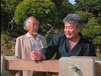 An Okinawan bad ass chopping a log in futility