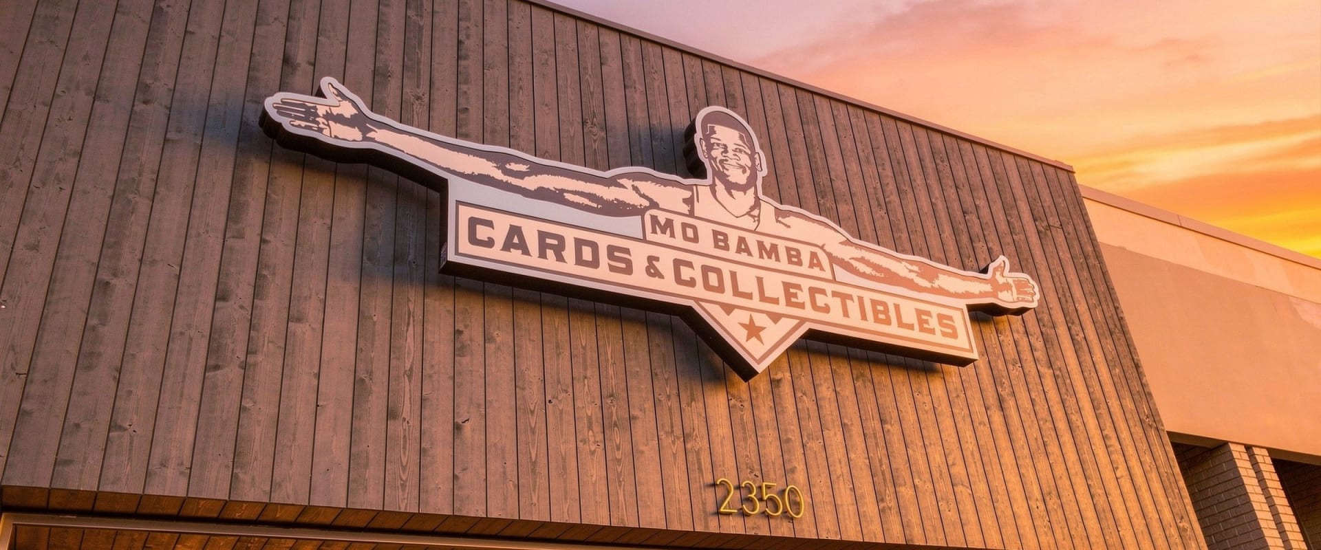 Mo Bamba Cards & Collectibles storefront sign at 2350 Guadalupe St, Austin TX