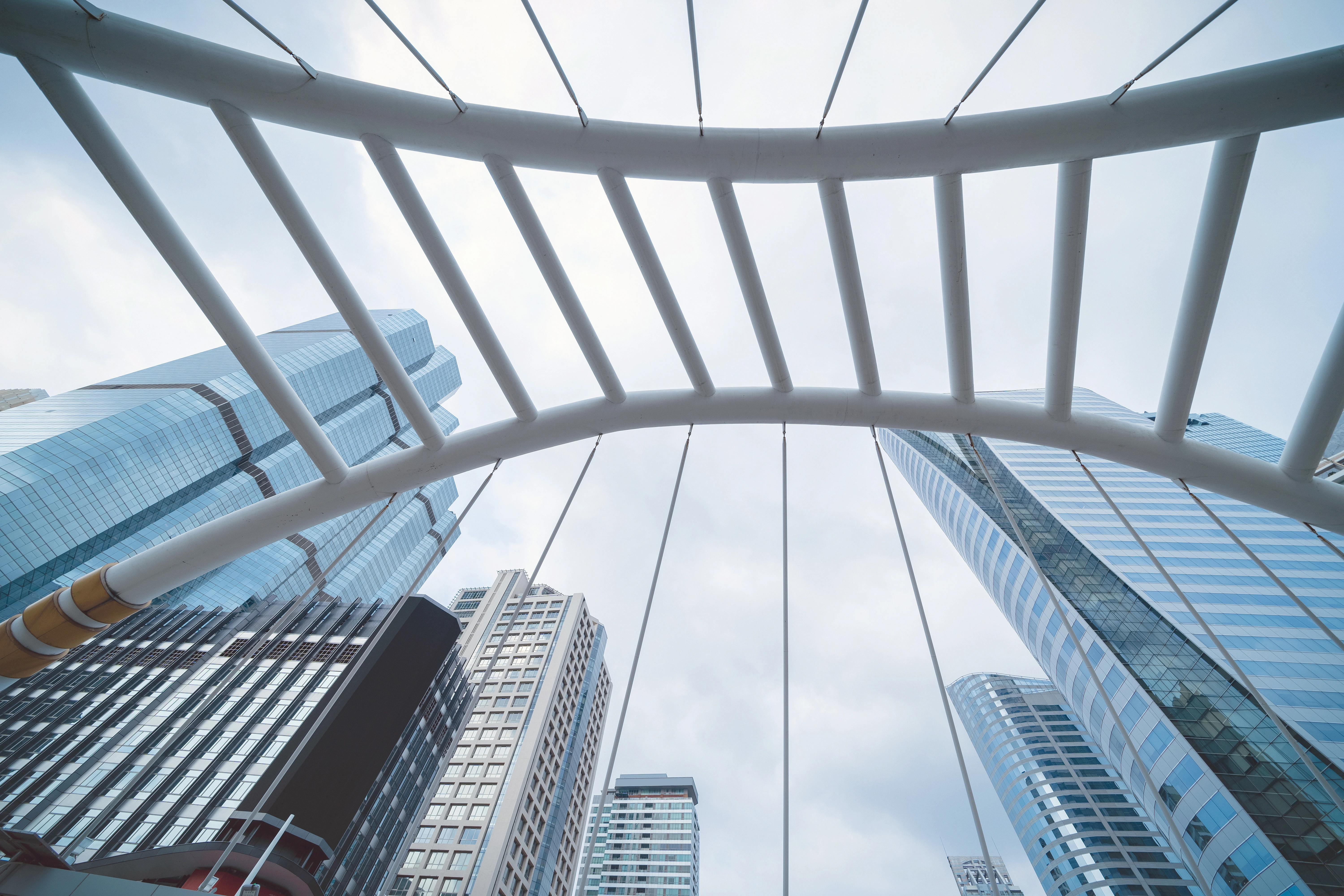 Modern urban skyline with architectural bridge