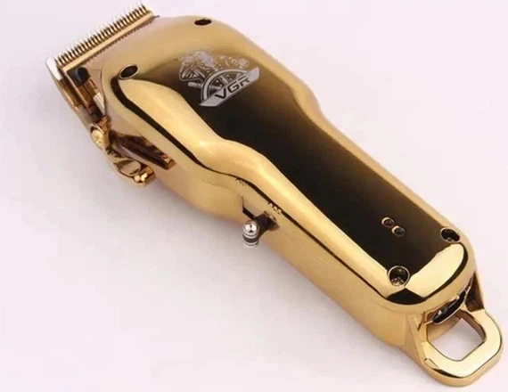 Машинка для стрижки VGR V-678 професійна акумуляторна 8 Вт металева з USB зарядкою 180 хв роботи насадки 3 6 10 13 мм — 4