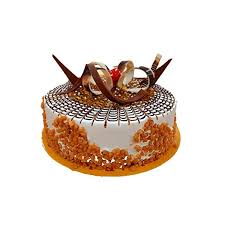 Butterscotch cake with nuts and garnishes