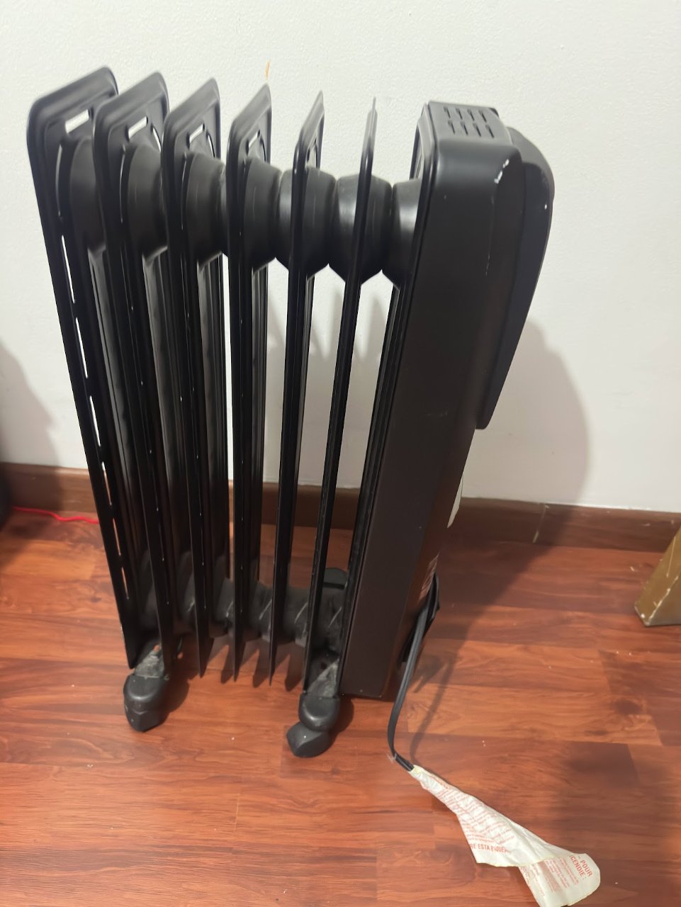 Calefactor radiador eléctrico DeLonghi SafeHeat con termostato 5