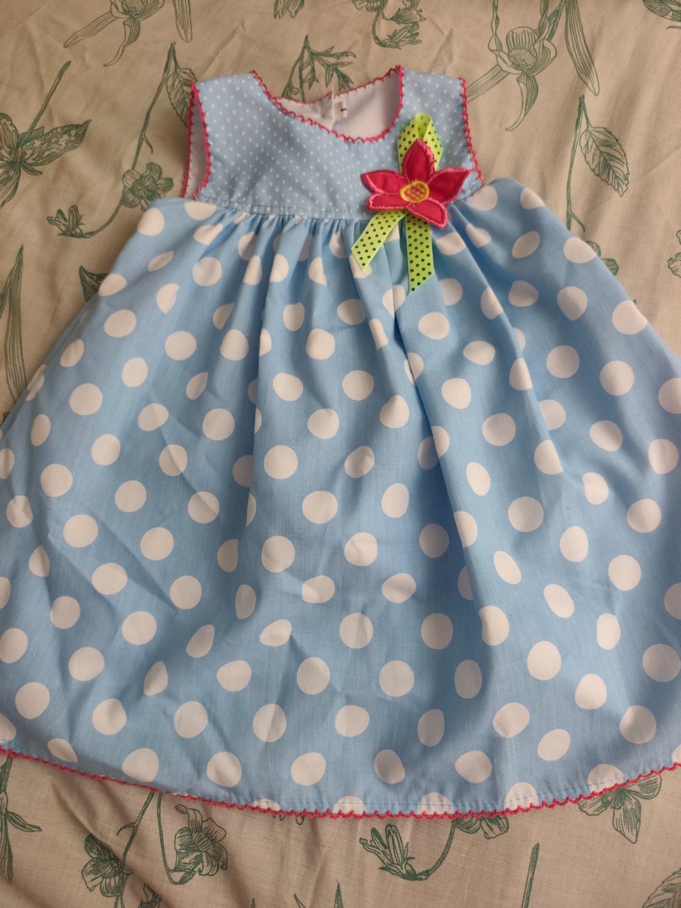 Vestido Niña Lunares Azul con Flor Roja