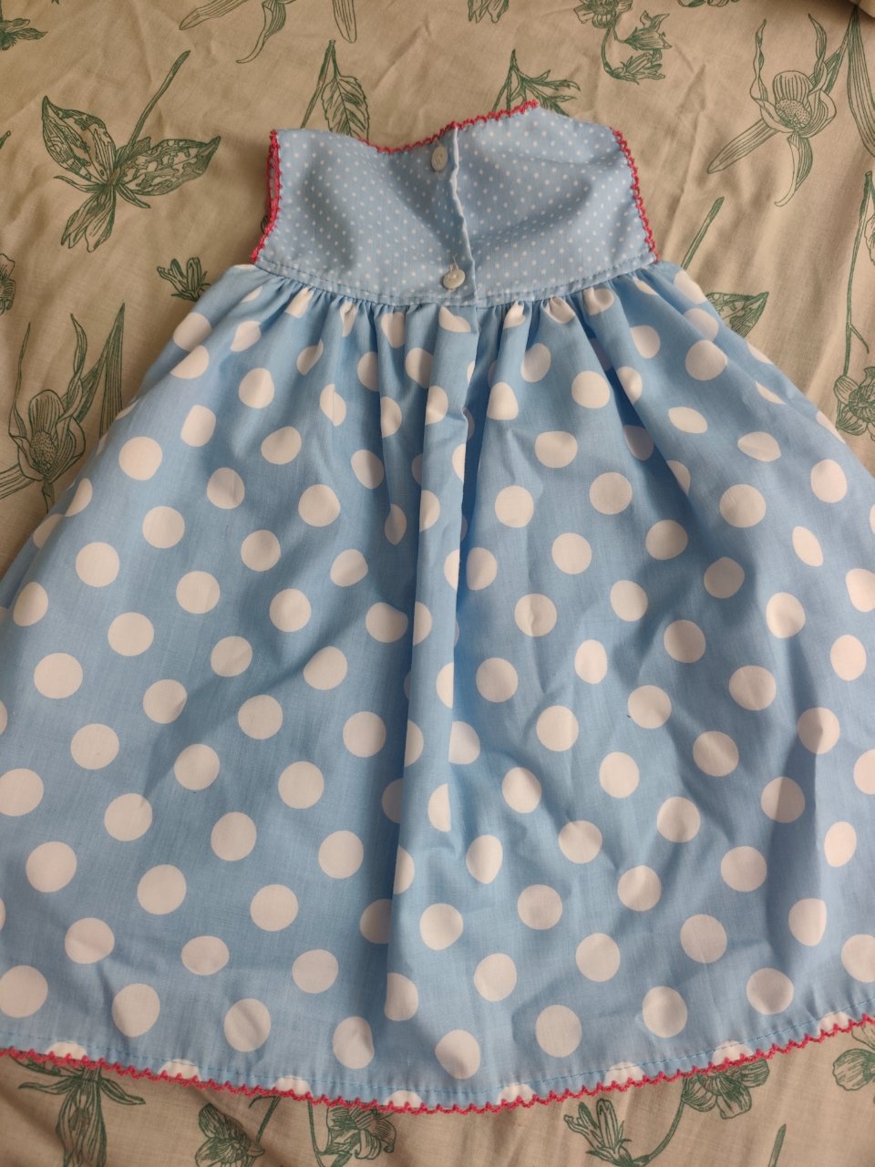 Vestido Niña Lunares Azul con Flor Roja