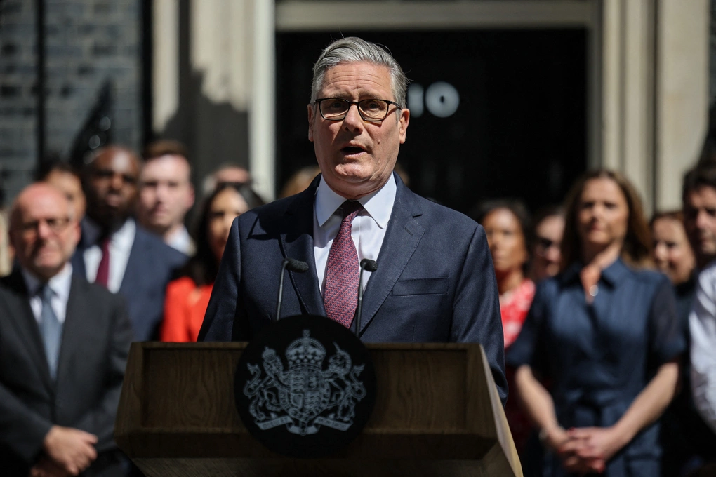 New political leader arriving at a historic government location, realistic news photo, no text or logos
