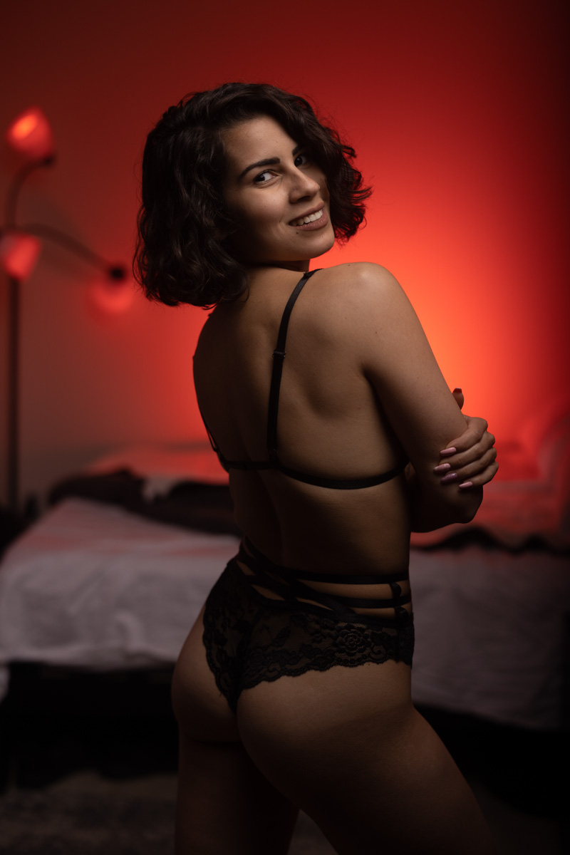 Boudoir portrait with dramatic shadow play