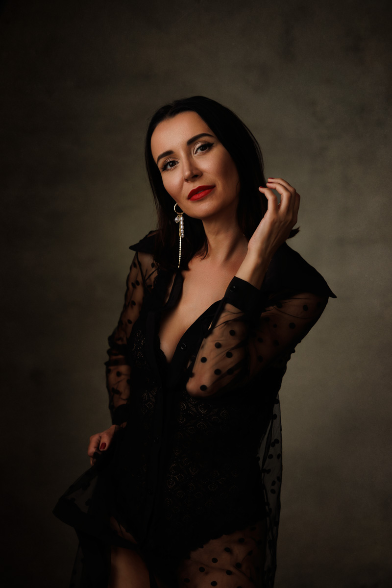 Fine art portrait with dramatic chiaroscuro lighting