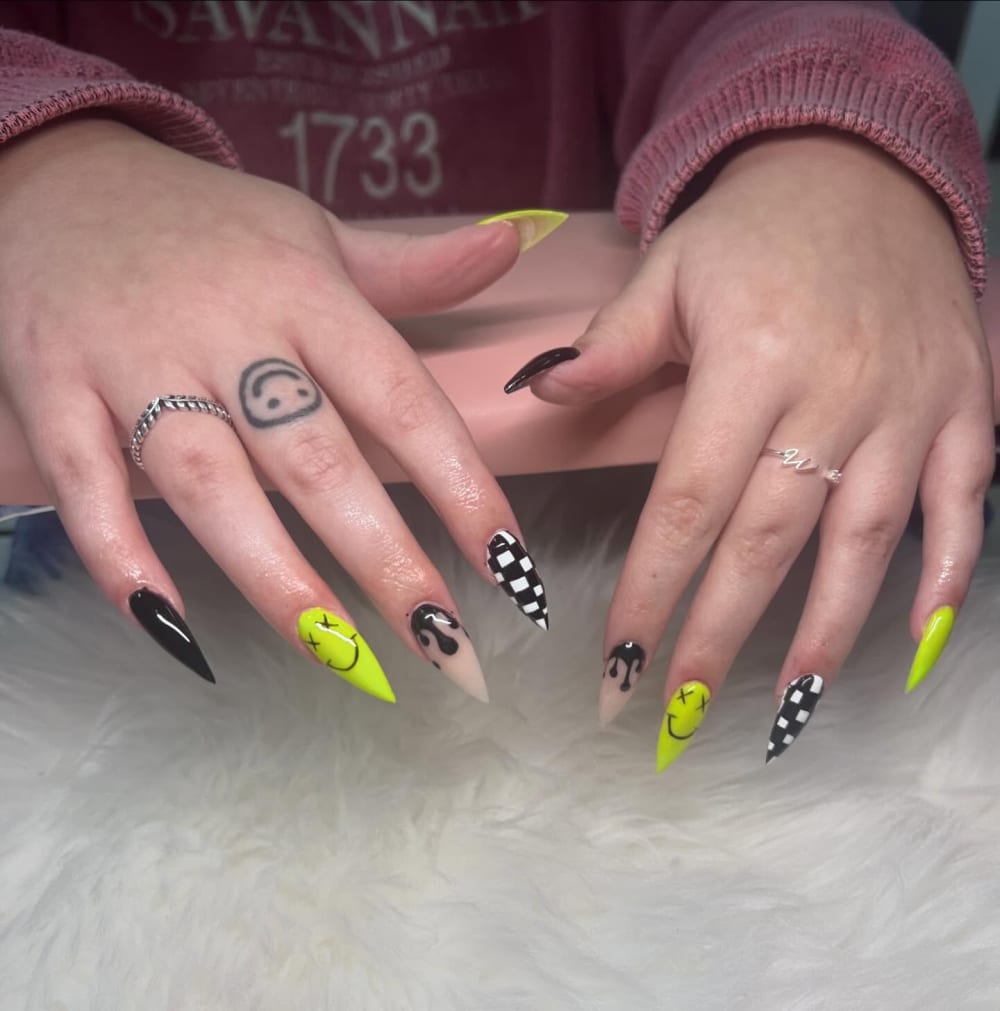 green and white nail art and glitter nails, stiletto shape — nail salon in Calhoun, GA — Sonny & Tee