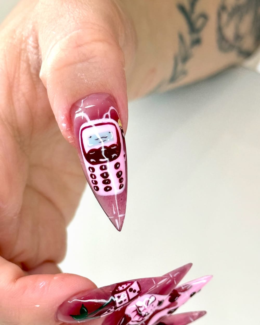 pink and white nail art nails, stiletto shape — nail salon in Calhoun, GA — Sonny & Tee