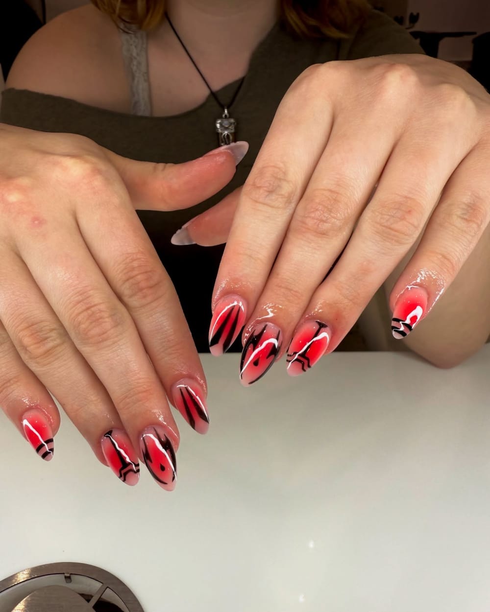 red and black nail art nails, almond shape — nail salon in Calhoun, GA — Sonny & Tee