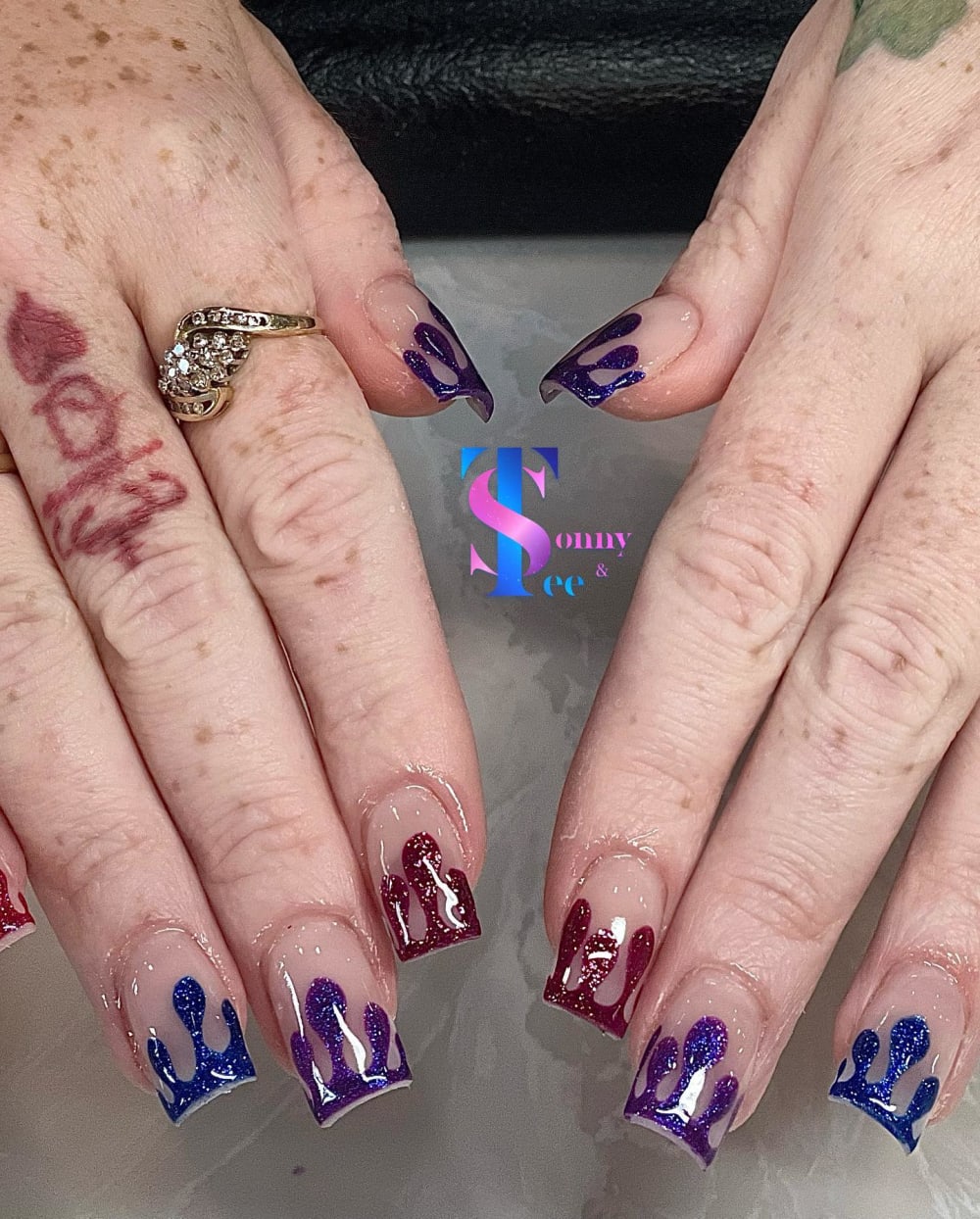 red and blue nail art and glitter nails, square shape — nail salon in Rome, GA — Sonny & Tee