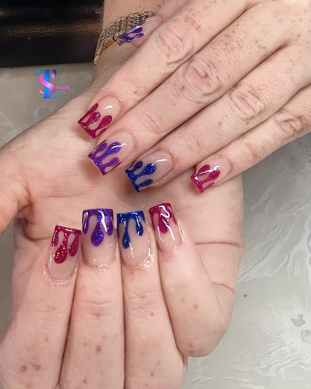 red and blue nail art and glitter nails, square shape — nail salon in Rome, GA — Sonny & Tee