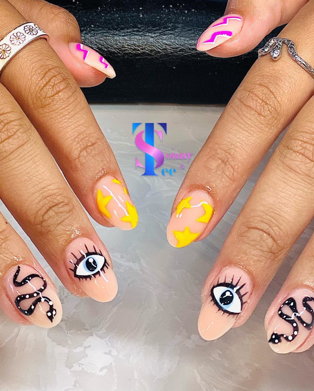 nude and black nail art nails, oval shape — nail salon in Rome, GA — Sonny & Tee