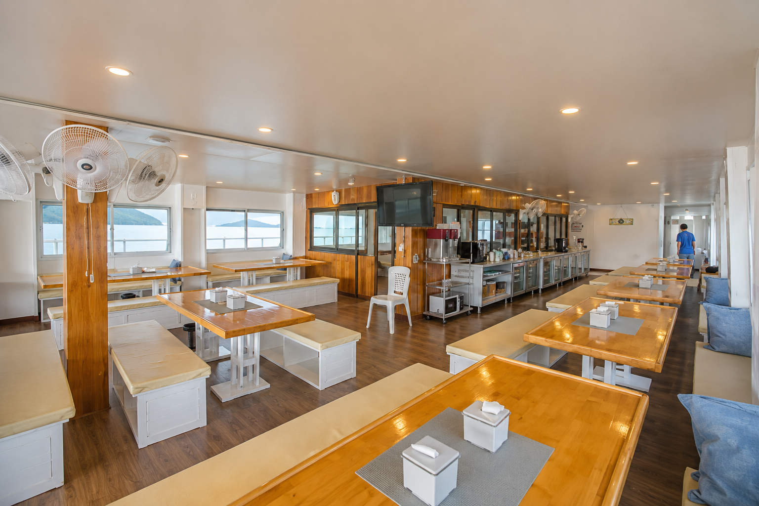 Indoor dining salon with Thai buffet setup
