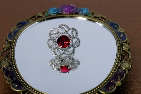 Red Crystal Center Cocktail Ring with Floral CZ Halo & Silver Finish Design