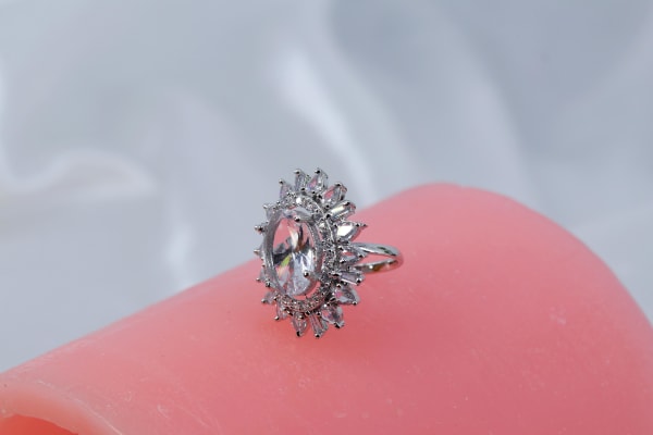 Oval White Stone Cocktail Ring with Halo CZ Setting & Silver Finish – Party Wear