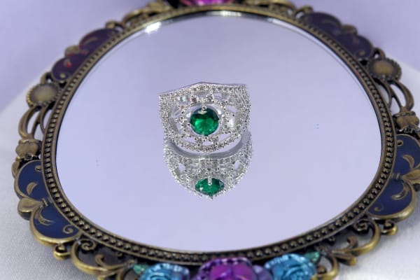 Elegant Oval Green Stone Cocktail Ring with Sparkling CZ Halo in Silver Finish