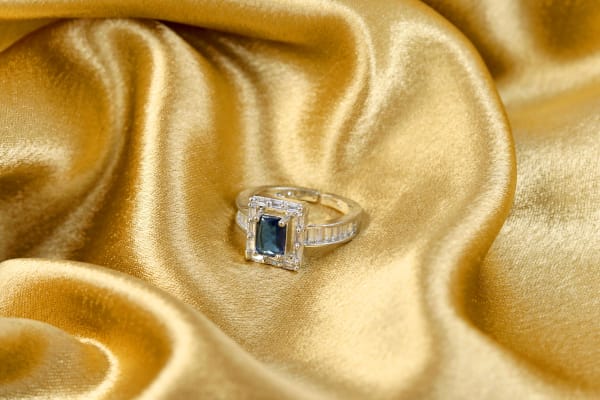 Blue Emerald-Cut Stone Silver Ring with Sleek Baguette Accent Band