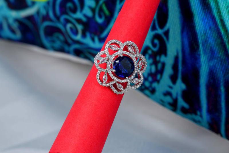 Elegant Blue Stone Floral Statement Ring with CZ Accents & Silver Shine Finish