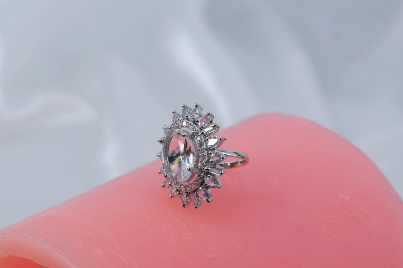 Oval White Stone Cocktail Ring with Halo CZ Setting & Silver Finish – Party Wear