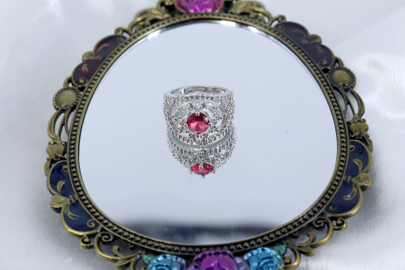 Silver Wide-Band Red CZ Cocktail Ring with Sparkling Halo & Cutwork Design