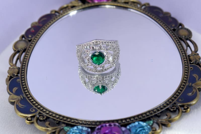 Elegant Oval Green Stone Cocktail Ring with Sparkling CZ Halo in Silver Finish