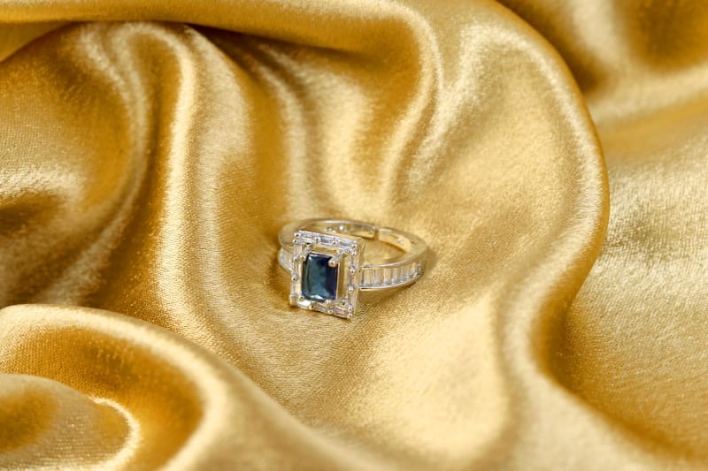 Blue Emerald-Cut Stone Silver Ring with Sleek Baguette Accent Band