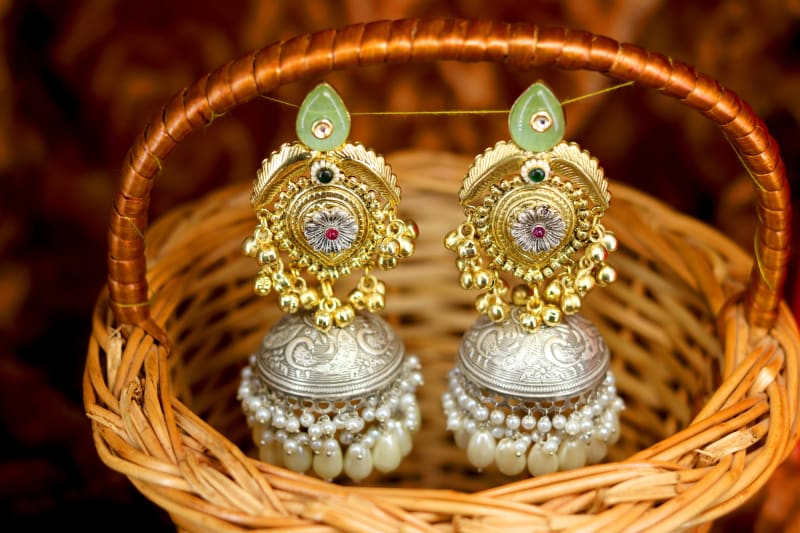 Gold & Silver-Plated Dual-Tone Pearl Jhumka Earrings for Women | Green Stone Top with Floral Centre | Heavy Traditional Wedding Jewellery