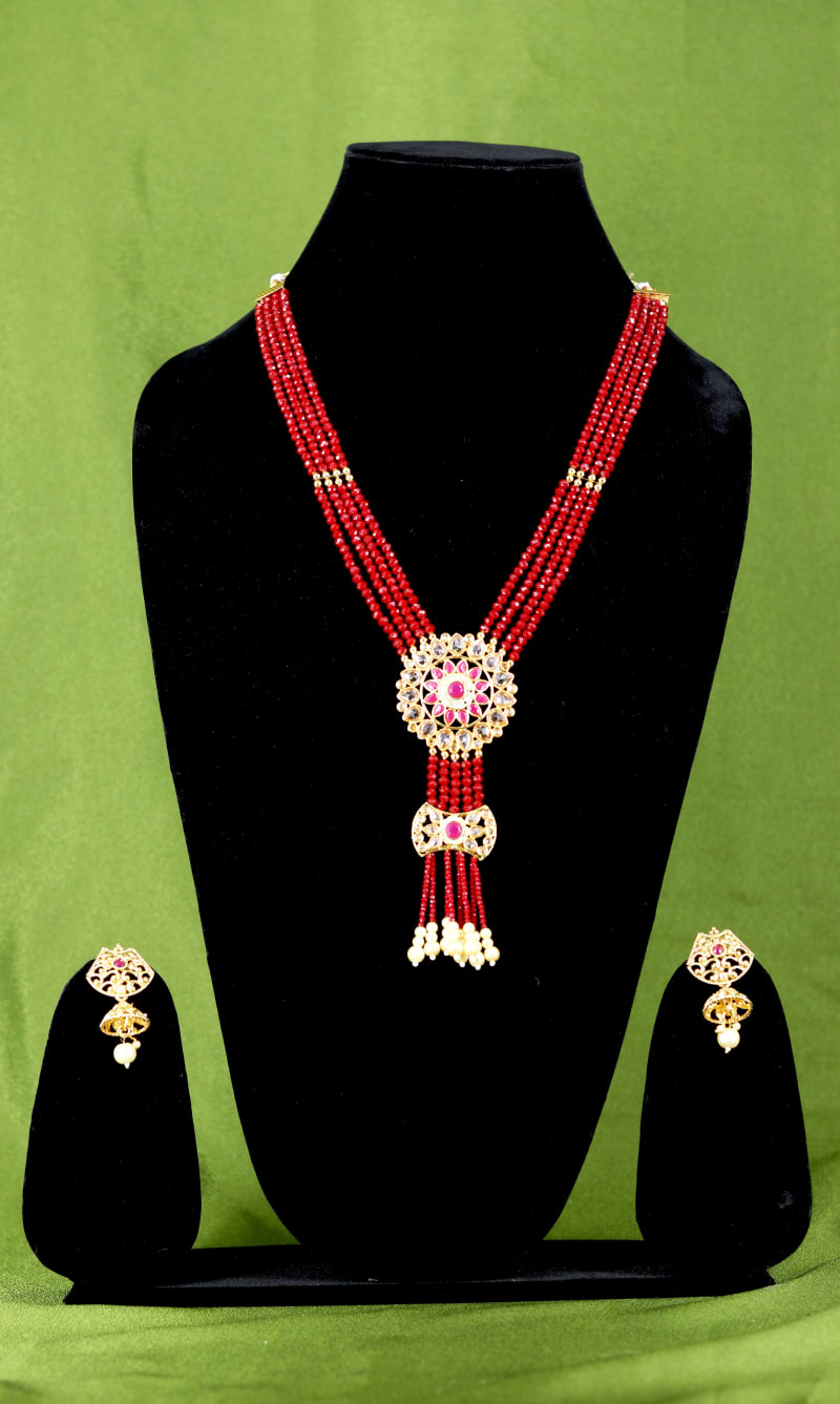 Handcrafted Red Beads Multi-Strand Necklace Set with Kundan Pendant & Pearl Tassels | Premium Gold-Plated Traditional Jewellery with Matching Earrings